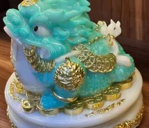 Thiềm thừ xanh ngậm xâu tiền có ý nghĩa gì với chủ nhân